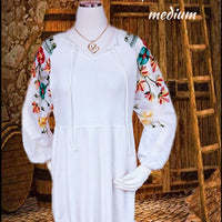 Beautiful white knit dress with sheer embroidered sleeves - size med (b)
